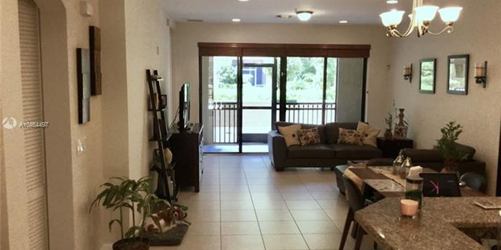house for sale sign in Artesia