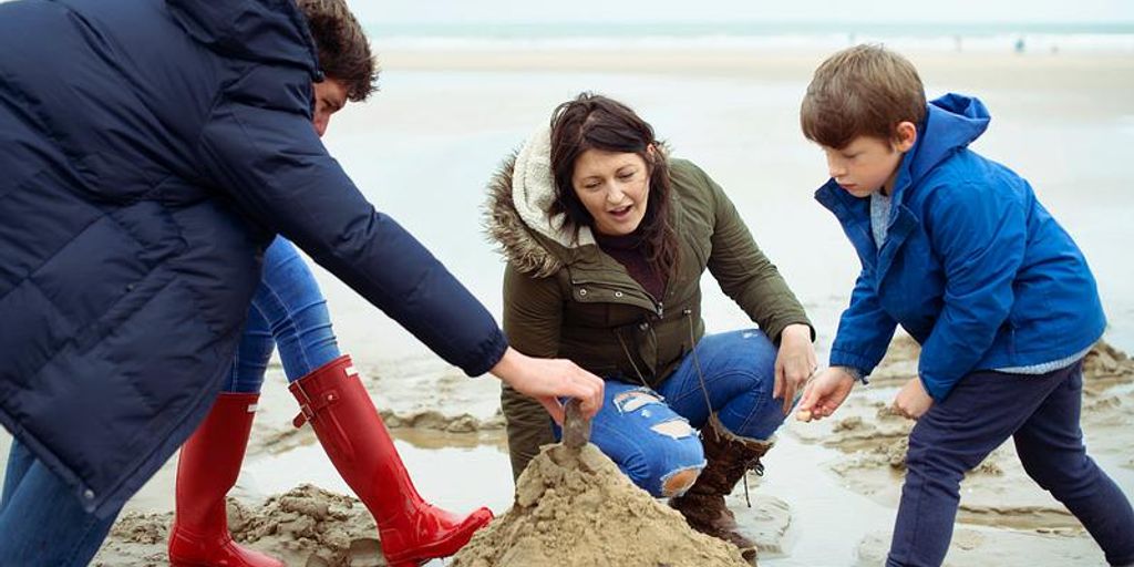 happy family selling house to real estate agent in Morro Bay