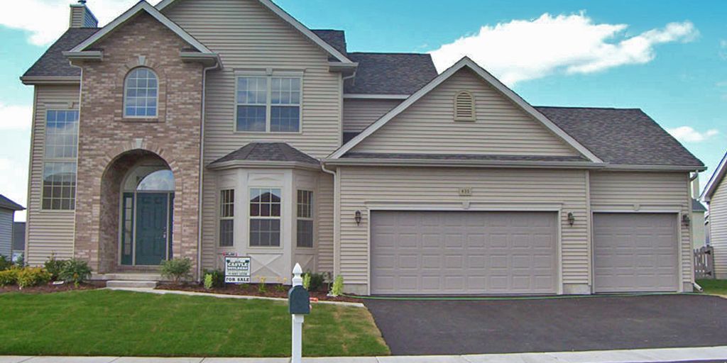 family celebrating house sale in Apple Valley