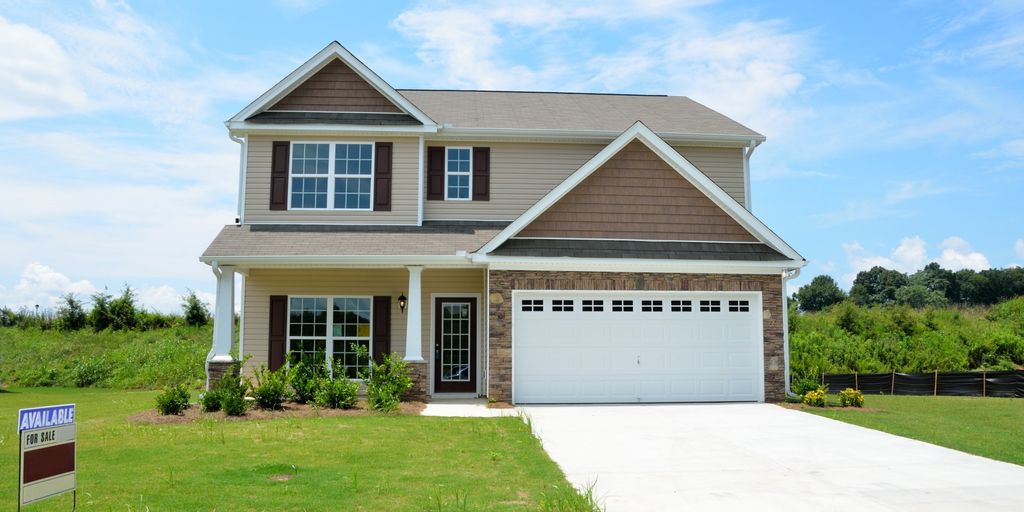 family celebrating house sale in Huntington Park